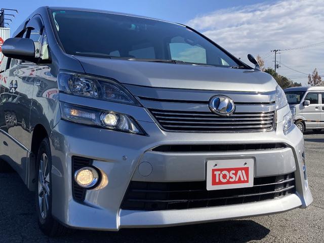 ヴェルファイアハイブリッド ＺＲ　４ＷＤ　社外ＳＤナビ　フルセグ　純正エアロ　純正１６インチアルミ　両側電動スライドドア　ＥＴＣ　クルーズコントロール　バックカメラ　ＡＦＳ　ウッドコンビステア　ＨＩＤヘッドライト（25枚目）