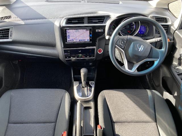 フィット 13G・F 4WD 純正SDナビ フルセグ バックカメラ DVD再生 横滑り防止 社外15インチアルミ スマートキー ETC オートリトラミラー ステアリングリモコン(3枚目)