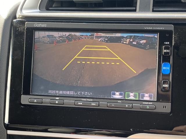 フィット 13G・F 4WD 純正SDナビ フルセグ バックカメラ DVD再生 横滑り防止 社外15インチアルミ スマートキー ETC オートリトラミラー ステアリングリモコン(6枚目)