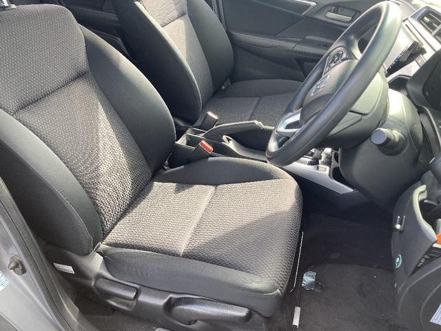 フィット 13G・F 4WD 純正SDナビ フルセグ バックカメラ DVD再生 横滑り防止 社外15インチアルミ スマートキー ETC オートリトラミラー ステアリングリモコン(13枚目)