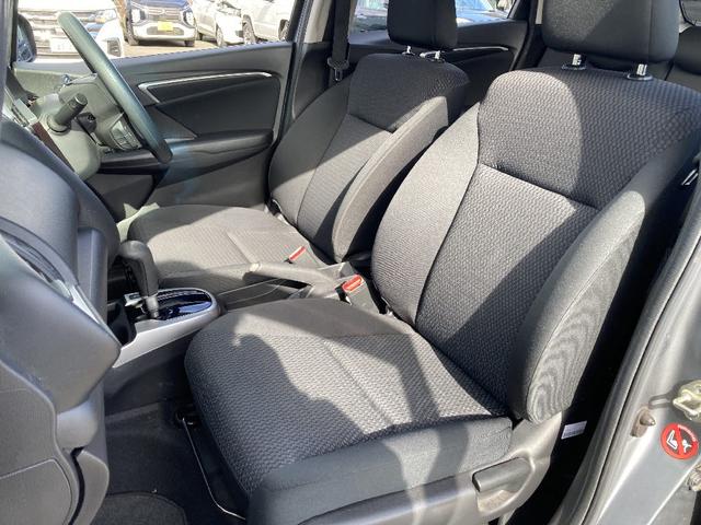 フィット 13G・F 4WD 純正SDナビ フルセグ バックカメラ DVD再生 横滑り防止 社外15インチアルミ スマートキー ETC オートリトラミラー ステアリングリモコン(14枚目)