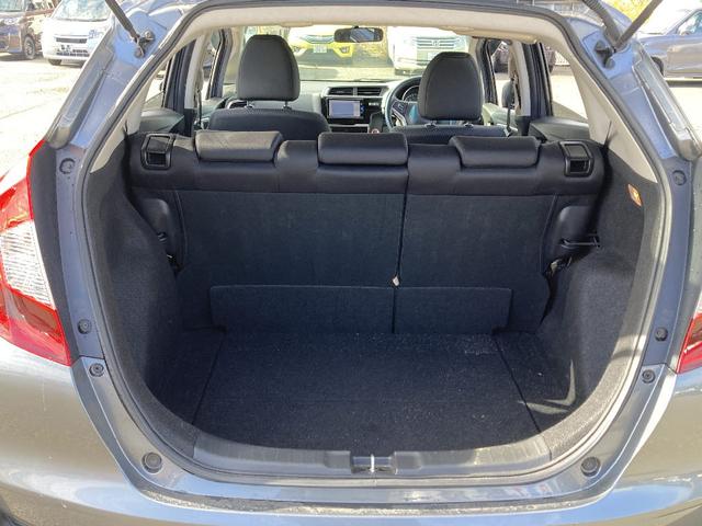 フィット 13G・F 4WD 純正SDナビ フルセグ バックカメラ DVD再生 横滑り防止 社外15インチアルミ スマートキー ETC オートリトラミラー ステアリングリモコン(16枚目)