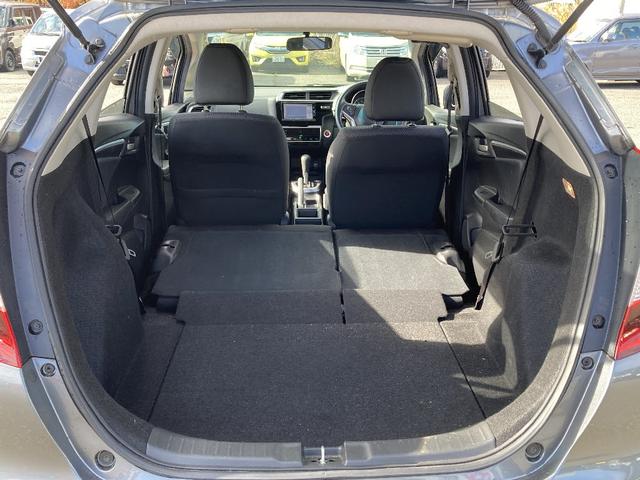 フィット 13G・F 4WD 純正SDナビ フルセグ バックカメラ DVD再生 横滑り防止 社外15インチアルミ スマートキー ETC オートリトラミラー ステアリングリモコン(17枚目)