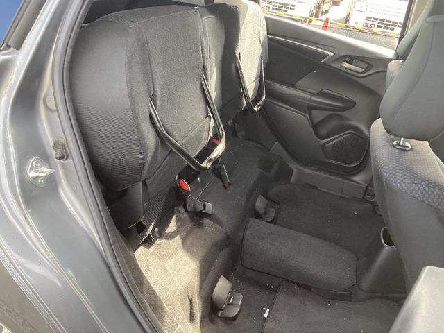 フィット 13G・F 4WD 純正SDナビ フルセグ バックカメラ DVD再生 横滑り防止 社外15インチアルミ スマートキー ETC オートリトラミラー ステアリングリモコン(18枚目)