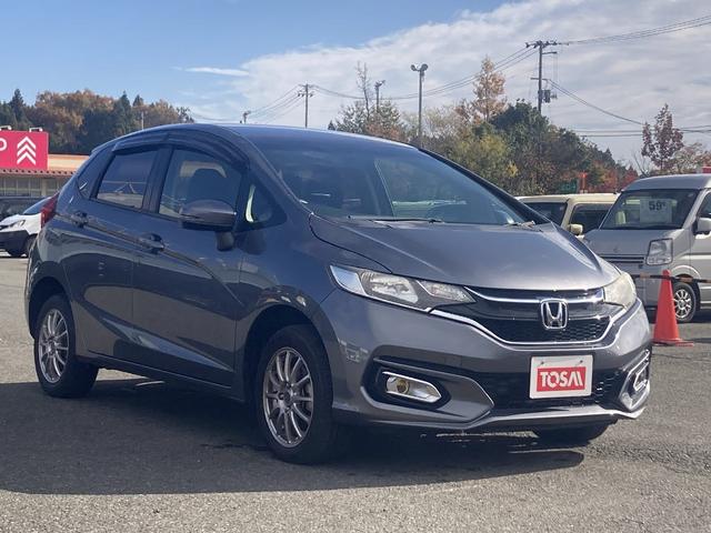 フィット 13G・F 4WD 純正SDナビ フルセグ バックカメラ DVD再生 横滑り防止 社外15インチアルミ スマートキー ETC オートリトラミラー ステアリングリモコン(20枚目)