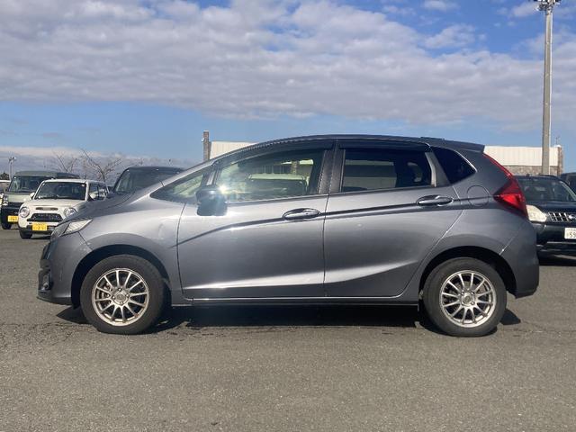 フィット 13G・F 4WD 純正SDナビ フルセグ バックカメラ DVD再生 横滑り防止 社外15インチアルミ スマートキー ETC オートリトラミラー ステアリングリモコン(24枚目)