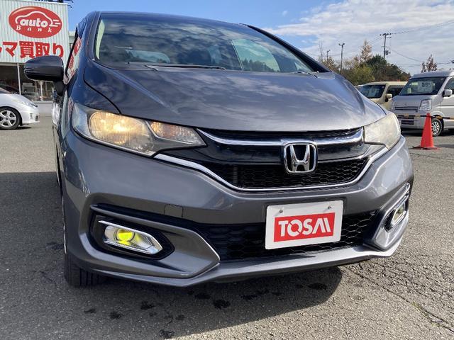 フィット 13G・F 4WD 純正SDナビ フルセグ バックカメラ DVD再生 横滑り防止 社外15インチアルミ スマートキー ETC オートリトラミラー ステアリングリモコン(25枚目)