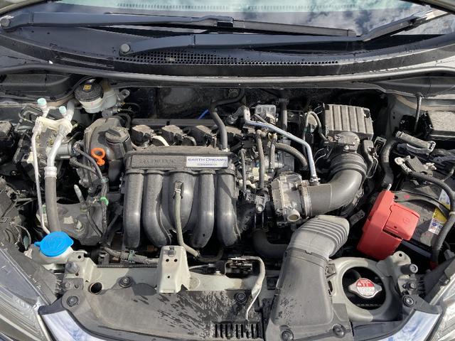 フィット 13G・F 4WD 純正SDナビ フルセグ バックカメラ DVD再生 横滑り防止 社外15インチアルミ スマートキー ETC オートリトラミラー ステアリングリモコン(27枚目)