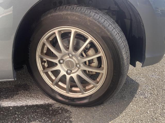 フィット 13G・F 4WD 純正SDナビ フルセグ バックカメラ DVD再生 横滑り防止 社外15インチアルミ スマートキー ETC オートリトラミラー ステアリングリモコン(30枚目)