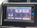 フィット 13G・F 4WD 純正SDナビ フルセグ バックカメラ DVD再生 横滑り防止 社外15インチアルミ スマートキー ETC オートリトラミラー ステアリングリモコン(5枚目)