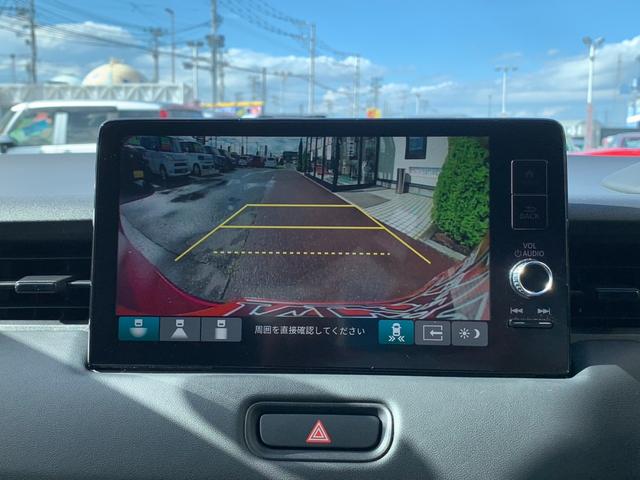 ヴェゼル ｅ：ＨＥＶ　Ｚ　４ＷＤ　純正ナビ　フルセグＴＶ　バックカメラ　Ｂｌｕｅｔｏｏｔｈオーディオ　ＥＴＣ２．０　置くだけ充電　電動リアゲート　後退出庫サポート　クリアランスソナー　ハーフレザーシート　エンケイ１８ＡＷ（12枚目）