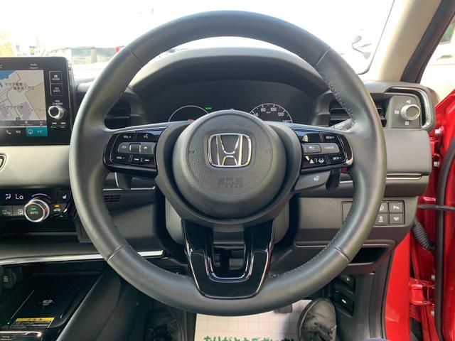 ヴェゼル ｅ：ＨＥＶ　Ｚ　４ＷＤ　純正ナビ　フルセグＴＶ　バックカメラ　Ｂｌｕｅｔｏｏｔｈオーディオ　ＥＴＣ２．０　置くだけ充電　電動リアゲート　後退出庫サポート　クリアランスソナー　ハーフレザーシート　エンケイ１８ＡＷ（15枚目）