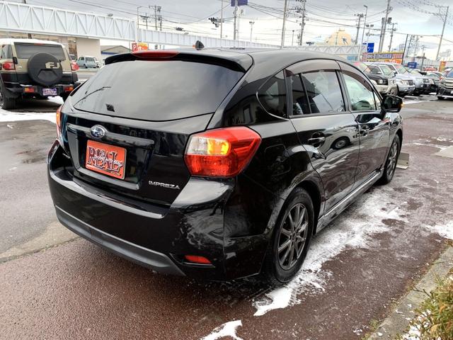 インプレッサスポーツ ２．０ｉ－Ｓアイサイト　４ＷＤ　衝突被害軽減装置　ナビ　フルセグＴＶ　バックカメラ　Ｂｌｕｅｔｏｏｔｈオーディオ　電動ハーフレザーシート　クルーズコントロール　ヘッドライトウォッシャ　社外アルミ　パドルシフト（9枚目）