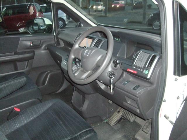 ステップワゴン Ｇ　４ＷＤ　ナビ　両側スライドドア　キーレスエントリー　３列シート　ＡＴ　盗難防止システム　衝突安全ボディ　ＡＢＳ　エアコン　パワーステアリング　パワーウィンドウ　運転席エアバッグ（5枚目）