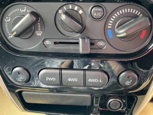 ジムニー ランドベンチャー　４ＷＤ　マニュアル５速　ターボ　ＣＤラジオ　シートヒーター　盗難防止システム　衝突安全ボディ　電動格納ミラー　運転駅助手席エアバック　ＡＢＳ　フォグランプ　ヘットライトレベライザー　ＭＴ　軽自動車（23枚目）