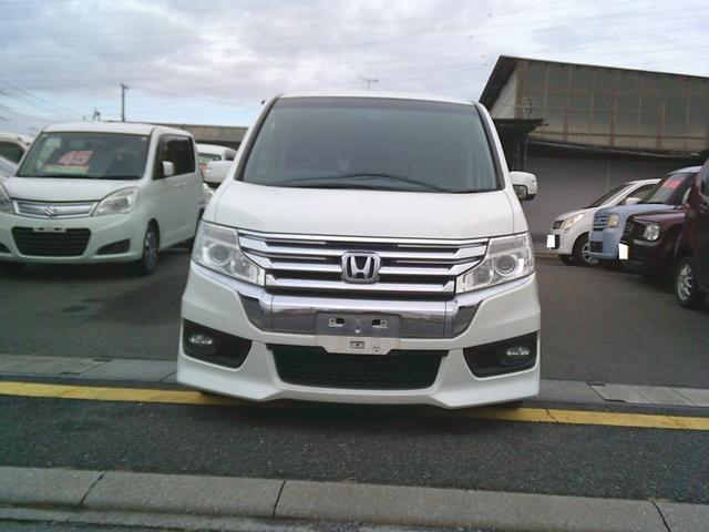 ステップワゴンスパーダ Ｚ　４ＷＤ　オートマ　リア両側電動スライドドア　ＨＩＤ　純正ナビ　バックカメラ　アイドリングストップ車　社外シートカバー　社外マフラー（2枚目）