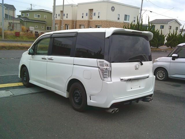 ステップワゴンスパーダ Ｚ　４ＷＤ　オートマ　リア両側電動スライドドア　ＨＩＤ　純正ナビ　バックカメラ　アイドリングストップ車　社外シートカバー　社外マフラー（9枚目）