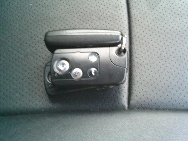 ステップワゴンスパーダ Ｚ　４ＷＤ　オートマ　リア両側電動スライドドア　ＨＩＤ　純正ナビ　バックカメラ　アイドリングストップ車　社外シートカバー　社外マフラー（18枚目）