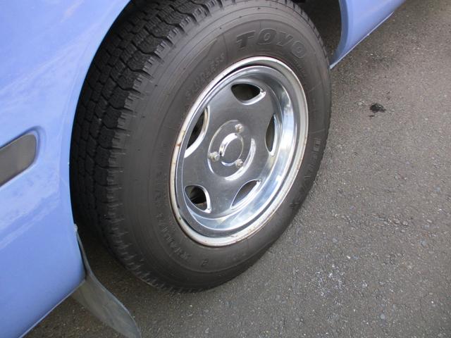 コースター ロングＧＸターボ　２９人乗り　自動スイングドア　オートエアコン　メモリーナビ　バックモニター　ＥＴＣ　モケットシート　冷蔵庫　ディーゼルターボ　純正メッキホイールカバー（18枚目）