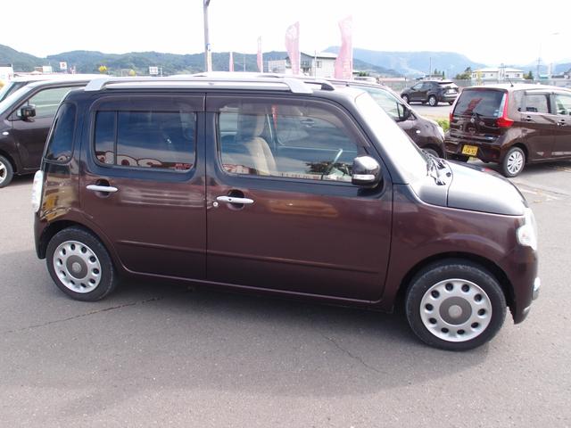 ミラココア ココアプラスＸスペシャルコーデ　４ＷＤ　スマートキー　社外エンジンスターター　電動格納ミラー　エコアイドル　純正ＣＤオーディオ（4枚目）