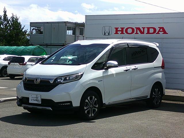 フリードハイブリッド ハイブリッド・クロスターホンダセンシング　純正ナビ・ＴＶ・バックカメラ・ＥＴＣ・ホンダセンシング・衝突軽減ブレーキ・クルーズコントロール・純正ドラレコ・純正エンスタ・純正アルミ・両側パワスラ・ＬＥＤヘッドライト・アクティブコーナリングライト・（4枚目）