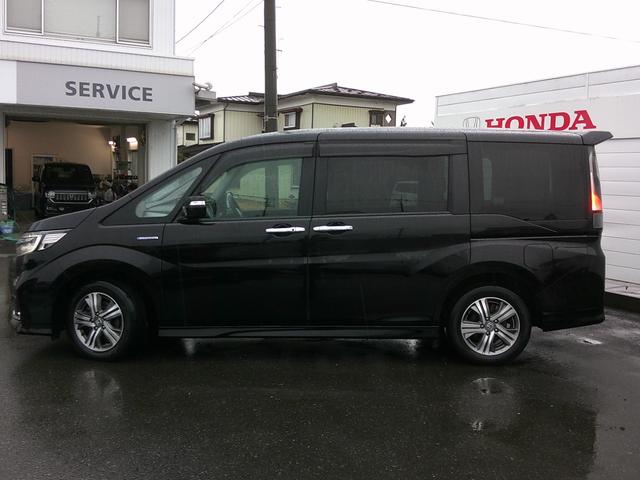 ステップワゴンスパーダ スパーダハイブリッドGホンダセンシング 純正ナビ・TV・バックカメラ・フリップダウンモニター・両側パワスラ・ETC・ホンダセンシング・衝突軽減ブレーキ・クルーズコントロール・レーンキープアシスト・電子パーキング・オートブレーキホールド機能(5枚目)