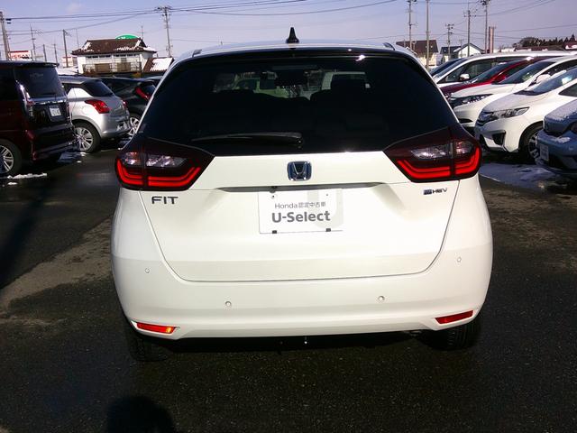 フィット ｅ：ＨＥＶベーシック　純正ナビ・ＴＶ・バックカメラ・ＥＴＣ・ホンダセンシング・衝突軽減ブレーキ・路外逸脱抑制機能・クルーズコントロール・電子パーキング・オートブレーキホールド機能・ドラレコ・ＬＥＤヘッドライト（7枚目）