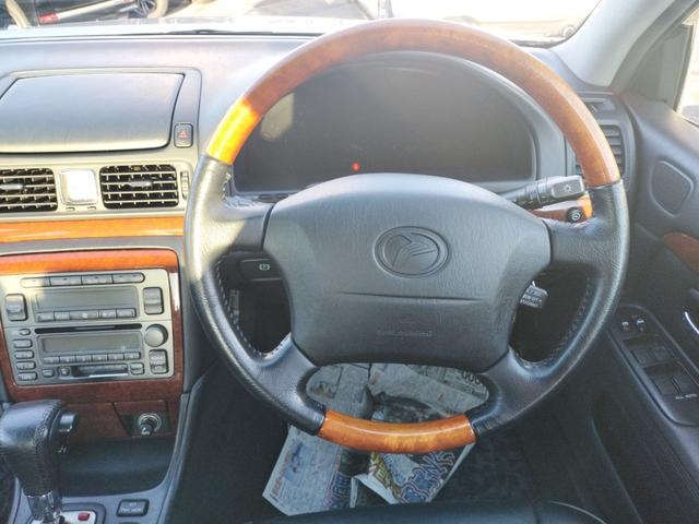 プログレ NC300 iRバージョン ETC オートクルーズコントロール ナビ エアロ アルミホイール オートライト AT キーレスエントリー 電動格納ミラー パワーシート 革シート CD カセット 衝突安全ボディ ABS ESC(3枚目)