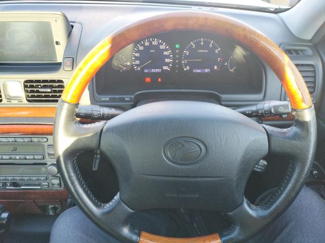 プログレ NC300 iRバージョン ETC オートクルーズコントロール ナビ エアロ アルミホイール オートライト AT キーレスエントリー 電動格納ミラー パワーシート 革シート CD カセット 衝突安全ボディ ABS ESC(4枚目)