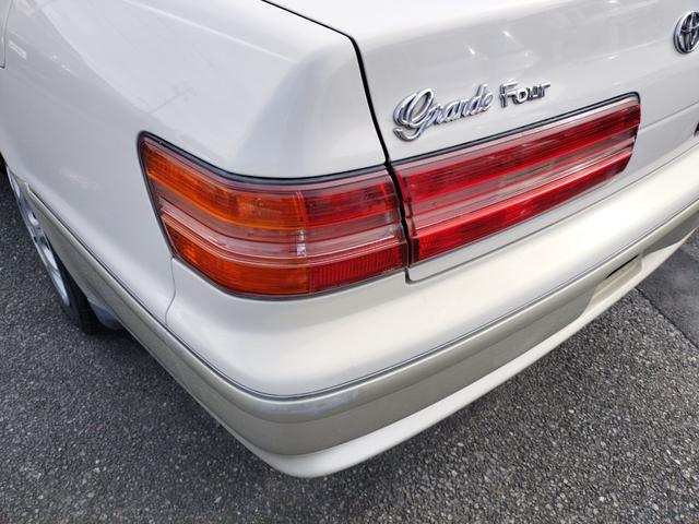 マークII グランデＦｏｕｒ　４ＷＤ　ナビ　オートライト　ＡＴ　キーレスエントリー　パワーシート　ＣＤ　カセット　衝突安全ボディ　ＡＢＳ　エアコン　パワーステアリング　パワーウィンドウ（32枚目）