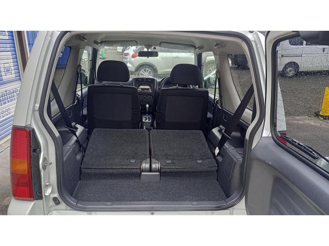 ジムニー ワイルドウインド 4WD ETC 冬タイヤ タイミングチェーン エンジンスターター キングピンベアリング左右交換済 社外オーディオ CD/MD AM/FM(16枚目)