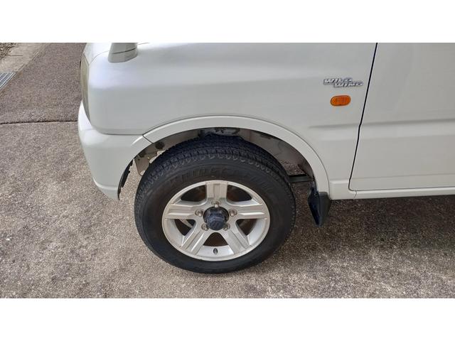 ジムニー ワイルドウインド 4WD ETC 冬タイヤ タイミングチェーン エンジンスターター キングピンベアリング左右交換済 社外オーディオ CD/MD AM/FM(43枚目)