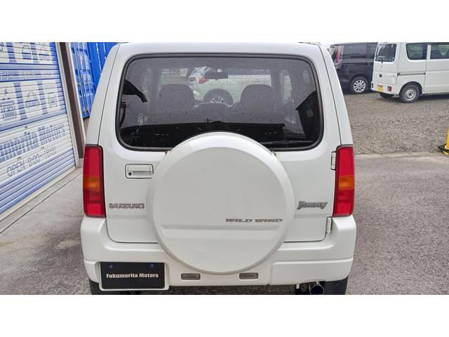 ジムニー ワイルドウインド 4WD ETC 冬タイヤ タイミングチェーン エンジンスターター キングピンベアリング左右交換済 社外オーディオ CD/MD AM/FM(49枚目)
