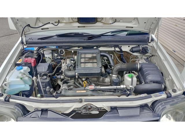 ジムニー ワイルドウインド 4WD ETC 冬タイヤ タイミングチェーン エンジンスターター キングピンベアリング左右交換済 社外オーディオ CD/MD AM/FM(51枚目)