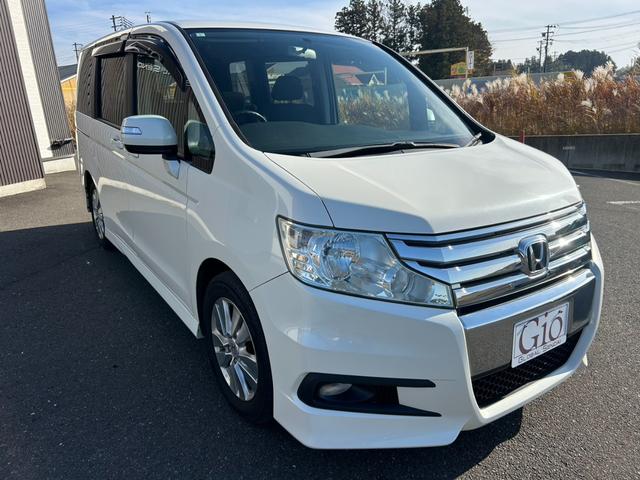 ステップワゴンスパーダ Ｓ　車検整備付き　８人乗り・ベンチシート　純正ＨＤＤインターナビＴＶ・Ｂモニター・ＤＶＤ再生・音楽録音　電動スライドドア　ＨＩＤライト＆フォグ　ビルトインＥＴＣ　純正１６インチアルミ　販売店保証（3枚目）