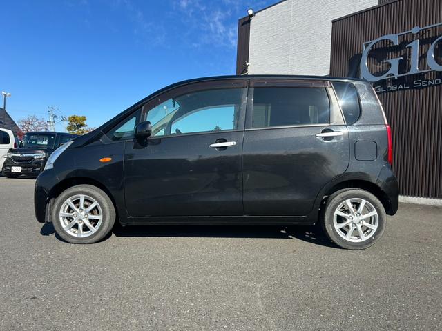 ムーヴ Ｘ　ワンオーナー車　純正オーディオ・ＡＵＸ接続　スマートキー＆プッシュスタート　ベンチシート　アイドリングＳＴＯＰ・オートエアコン・ｅｃｏモード　電動格納ミラー　純正１４インチＡＷ　販売店保証（8枚目）