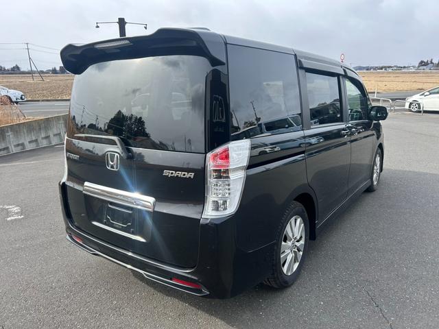 ステップワゴンスパーダ Ｚ　車検整備付き　８人乗り・ベンチシート　両側電動スライドドア　純正ＨＤＤインターナビＴＶ・Ｂモニター・ＤＶＤ再生・音楽録音　ＨＩＤライト＆フォグ　ビルトインＥＴＣ　スマートキー　純正１６インチアルミ（6枚目）