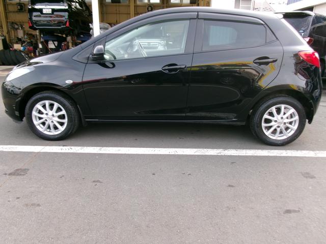 デミオ １３Ｃ－Ｖ　ＨＩＤエディション　純正オ－ディオ　パワーウィンドウ　電動格納ミラー　パワーステアリング　衝突安全ボディ　ＡＢＳ　マニュアルエアコン（14枚目）