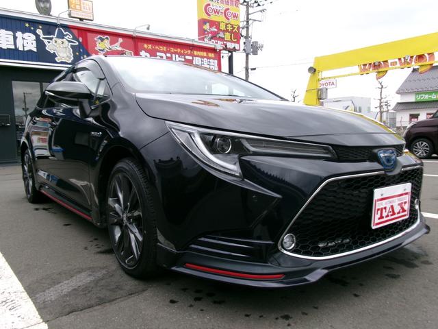 カローラツーリング ハイブリッド　ダブルバイビー　４ＷＤ　ブルートゥースオーディオ　電動格納ミラー　車線逸脱警報　ＡＨＢ　バックモニタ－　パーキングセンサー　ＬＥＤヘッド　シートヒーター　横滑り防止装置　クルーズコントロール　スマートキー　ＡＣ（9枚目）