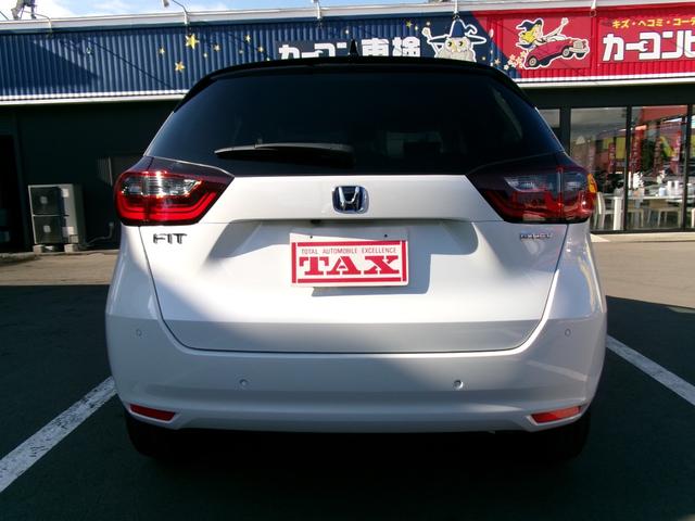 フィット ｅ：ＨＥＶホーム　４ＷＤ　ＬＫＡＳ　ＶＳＡ　オートマチックハイビーム　サイドカーテンエアバック　衝突安全ボディ　前後ソナー　スマートキ　ＥＣＯＮモード　踏み間違い防止　盗難防止装置　クルコン　パワーウィンドウ（12枚目）