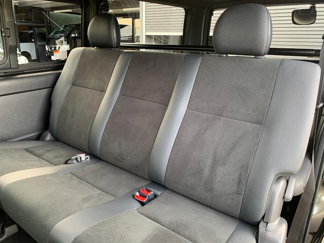 ハイエースバン スーパーＧＬ　ダークプライムＩＩ　４ＷＤ　禁煙車　ベッドキット　ＳＤナビフルセグＴＶ　バックカメラ　記録簿　ＥＴＣ　衝突被害軽減装置　ハーフレザー　イージークローズ付両側スライドドア　ＬＥＤオートライト　スマートキー　オートエアコン（27枚目）