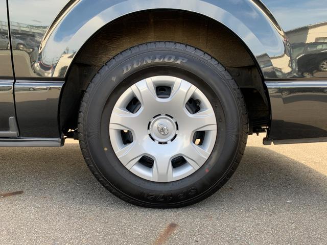 ハイエースバン スーパーＧＬ　ダークプライムＩＩ　４ＷＤ　禁煙車　ベッドキット　ＳＤナビフルセグＴＶ　バックカメラ　記録簿　ＥＴＣ　衝突被害軽減装置　ハーフレザー　イージークローズ付両側スライドドア　ＬＥＤオートライト　スマートキー　オートエアコン（48枚目）