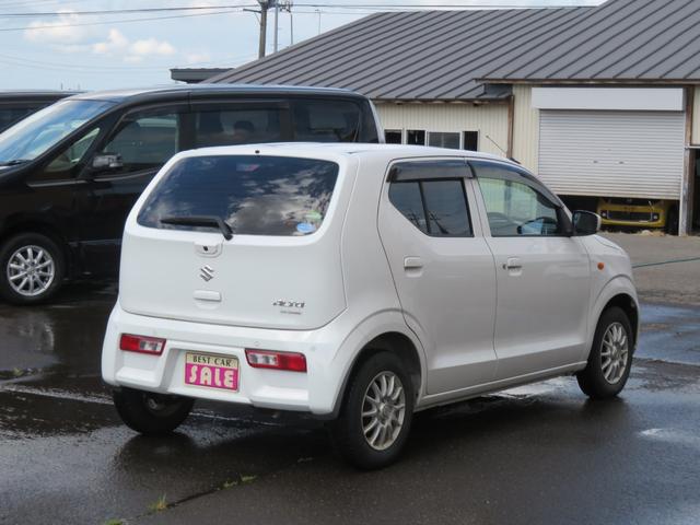 アルト L 4WDアイドリングストップ機能 衝突軽減前後センサー 社外ナビ バックカメラ ブルトウース機能 ETC スタッドレスタイヤ キーレス 禁煙車 電動格納ミラー ドアミラーボデイ同色(5枚目)