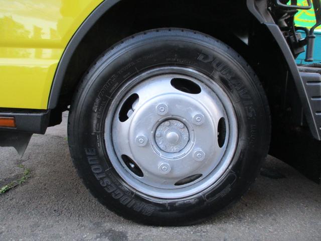 キャンター 全低床ダンプ　４ＷＤ　新品メッキパーツ　エアコン　パワステ　パワーウィンドウ（54枚目）