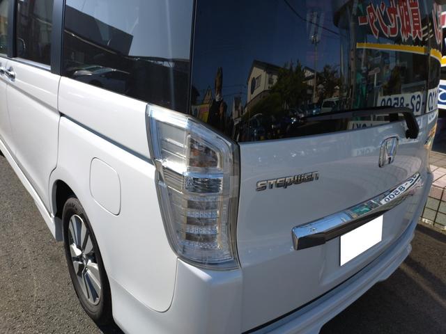 ステップワゴンスパーダ Ｚ　純正９インチナビ　フルセグＴＶ　Ｂカメラ　Ｂｌｕｅｔｏｏｔｈ　両側パワースライドドア　横滑り防止　ＨＩＤヘッドライト　ＥＴＣ　ドライブレコーダー前後　レザー調シートカバー　スペアキー（31枚目）