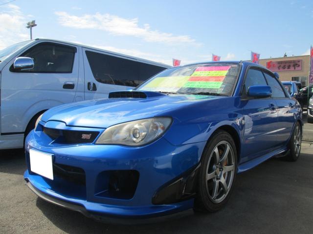 ＷＲＸ　ＳＴｉ　青森県内仕入れ　４ＷＤ　ターボ　６速ＭＴ　ローダウンサス　社外１７インチＡＷ　カロッツエリア製フルセグ対応メモリーナビ　カラーバックカメラ　社外ターボメーター　社外マルチメーター　ＥＴＣ　キーレスキー(3枚目)