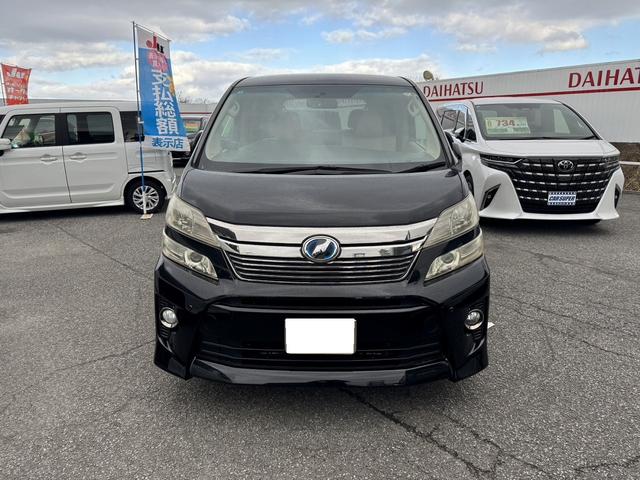 ヴェルファイアハイブリッド Ｘ　４ＷＤ　ドライブレコーダー　ＥＴＣ　ＴＶ　クリアランスソナー　オートクルーズコントロール　両側電動スライドドア　ＨＩＤ　スマートキー　電動格納ミラー　後席モニター　３列シート　ＣＶＴ　アルミホイール（15枚目）