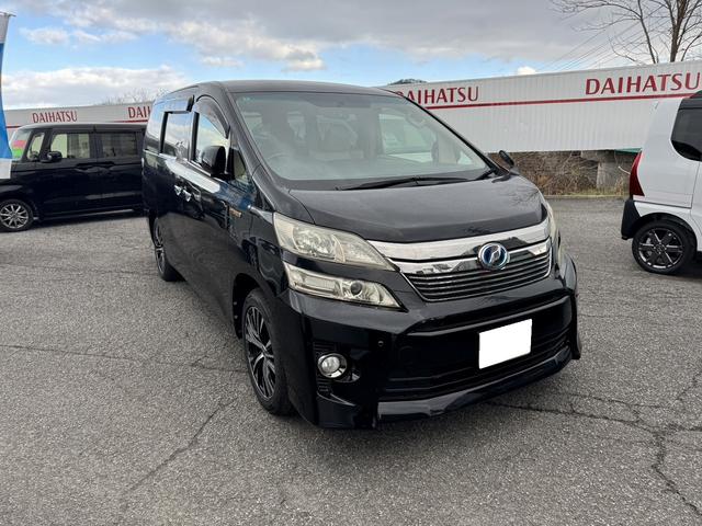 ヴェルファイアハイブリッド Ｘ　４ＷＤ　ドライブレコーダー　ＥＴＣ　ＴＶ　クリアランスソナー　オートクルーズコントロール　両側電動スライドドア　ＨＩＤ　スマートキー　電動格納ミラー　後席モニター　３列シート　ＣＶＴ　アルミホイール（16枚目）