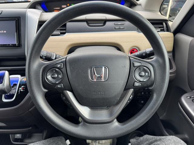 フリードハイブリッド ハイブリッド・Ｇホンダセンシング　４ＷＤ　ＥＴＣ　バックカメラ　オートクルーズコントロール　レーンアシスト　衝突被害軽減システム　両側電動スライドドア　オートライト　ＬＥＤヘッドランプ　スマートキー　電動格納ミラー　シートヒーター（3枚目）