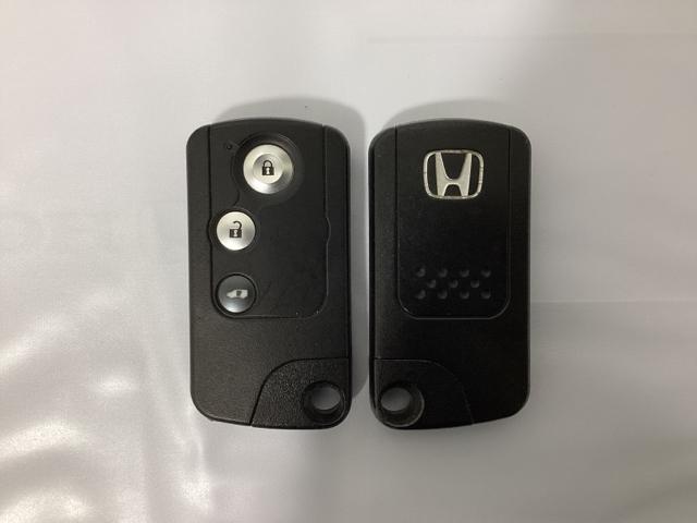 ステップワゴンスパーダ S 光触媒抗菌消臭施工済 Wエアバック スマートキーシステム 地デジ対応 両側スライド片側電動ドア パワステ パワーウインドウ 横滑り防止機能 キーレス Bカメラ エアバック ナビ&TV 3列シート(14枚目)